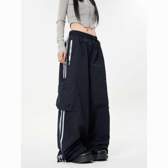 Versatile American High Street Straight Leg Pants with Big Pockets, Vertical Stripe Panels, and Athleisure Design - Loose, Comfortable, and Stylish Skinny Trousers.